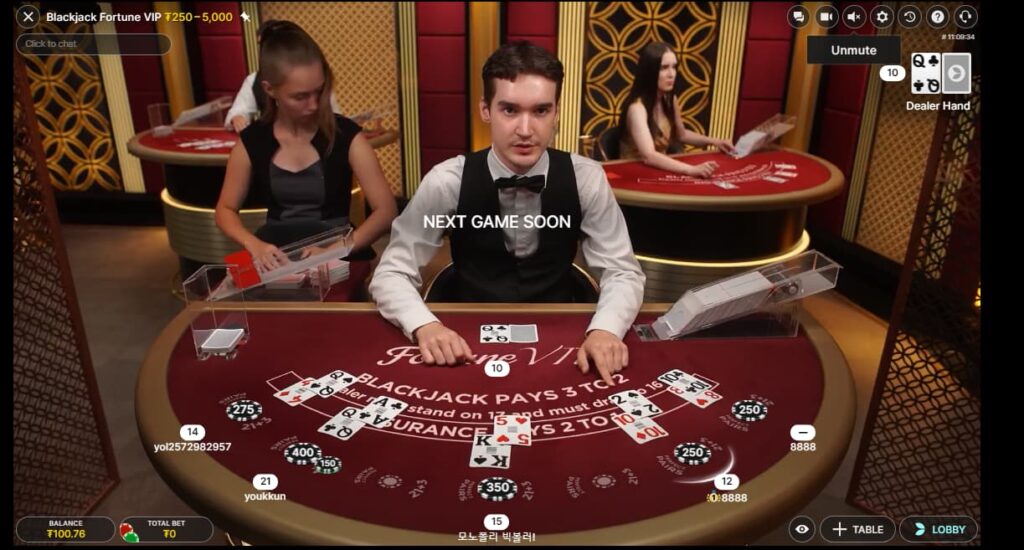 A live blackjack dealer on CoinPoker asks a player if they want to hit on 12 or stand.