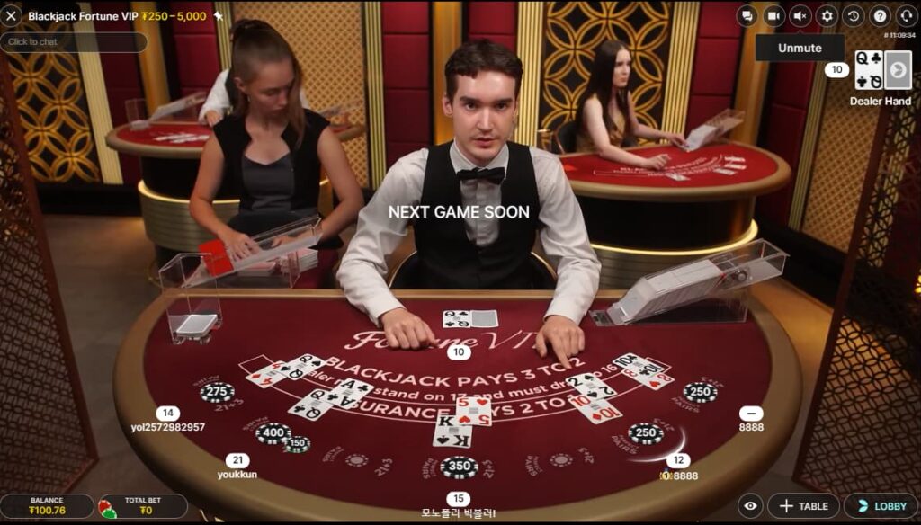 A live blackjack dealer on CoinPoker asks a player if they want to hit on 12 or stand.