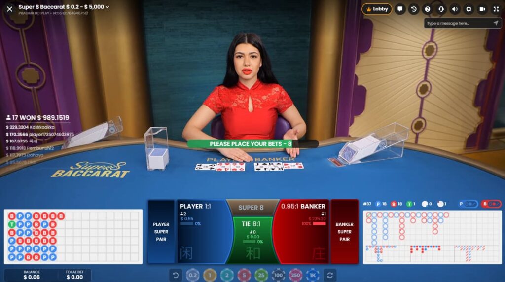 A live baccarat dealer hands a game of baccarat on the CoinPoker Casino app