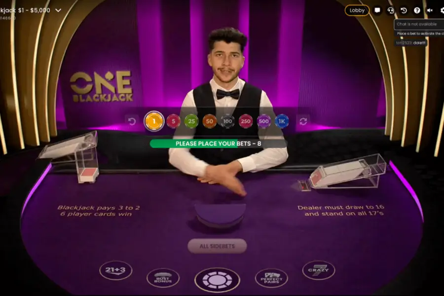 A player decides how much to bet in a game of Blackjack on CoinPoker.